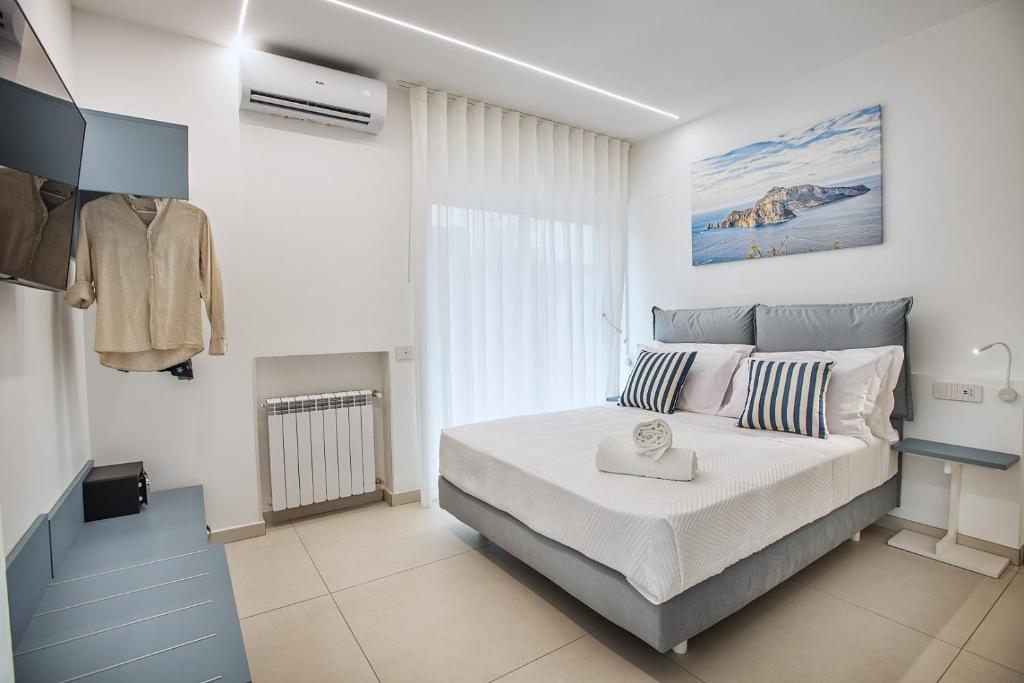 Postel nebo postele na pokoji v ubytování B&B GargiuloFamily