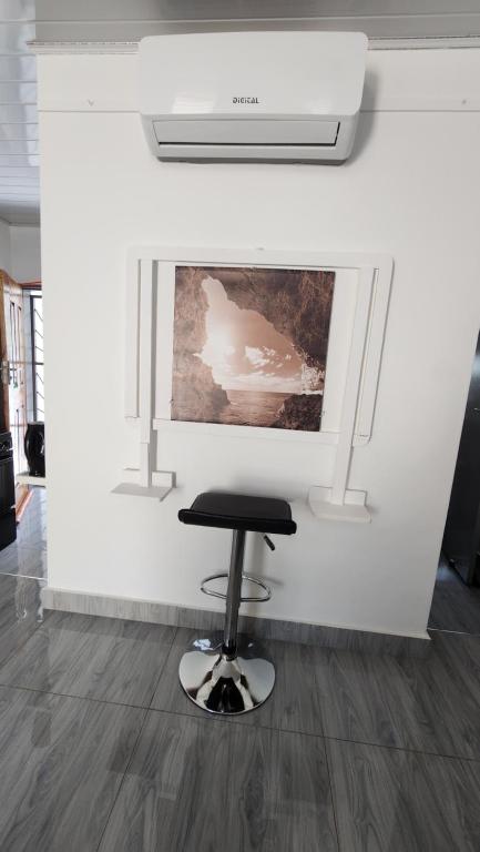TV a/nebo společenská místnost v ubytování Ticia Apartment, Chipata