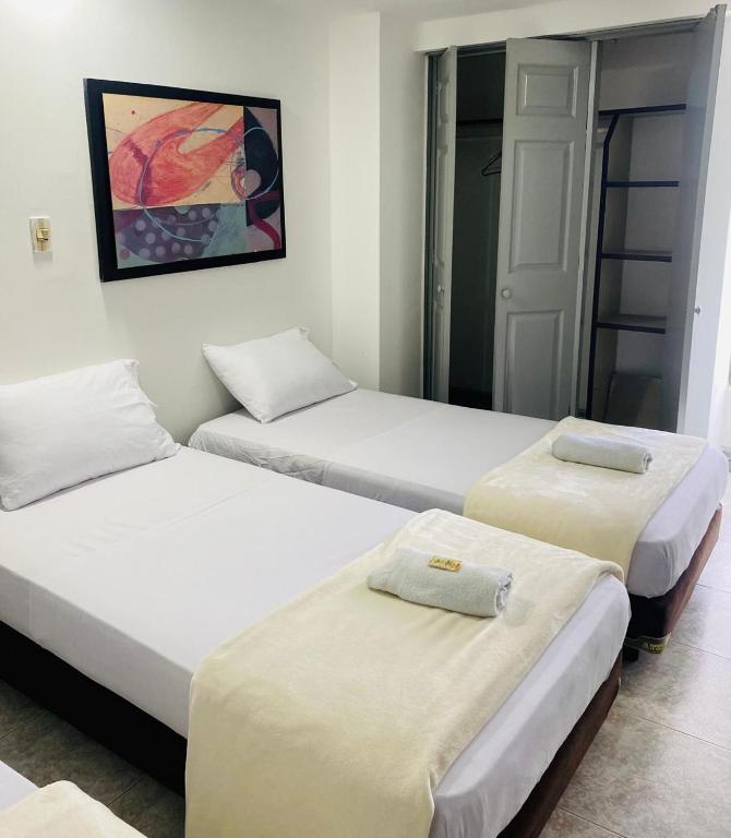 Letto o letti in una camera di Hotel Armenia Lions