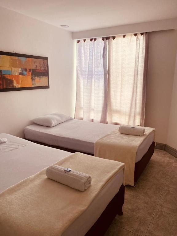 Letto o letti in una camera di Hotel Armenia Lions