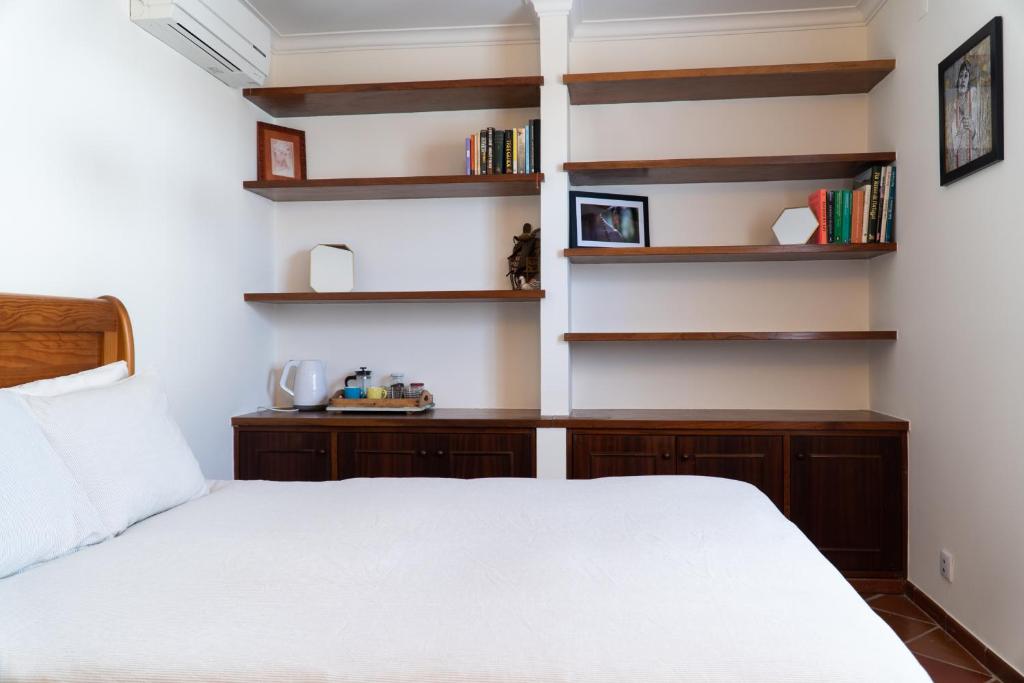 Postel nebo postele na pokoji v ubytování Casa Bolacha