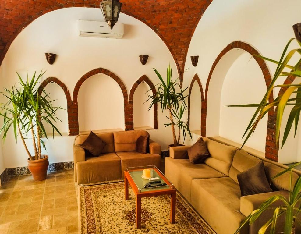 Posezení v ubytování Villa Kemet