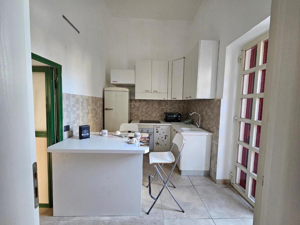 Kuchyň nebo kuchyňský kout v ubytování GeMy Apartment