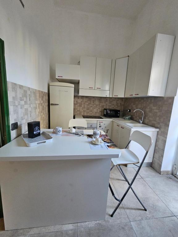 Kuchyň nebo kuchyňský kout v ubytování GeMy Apartment