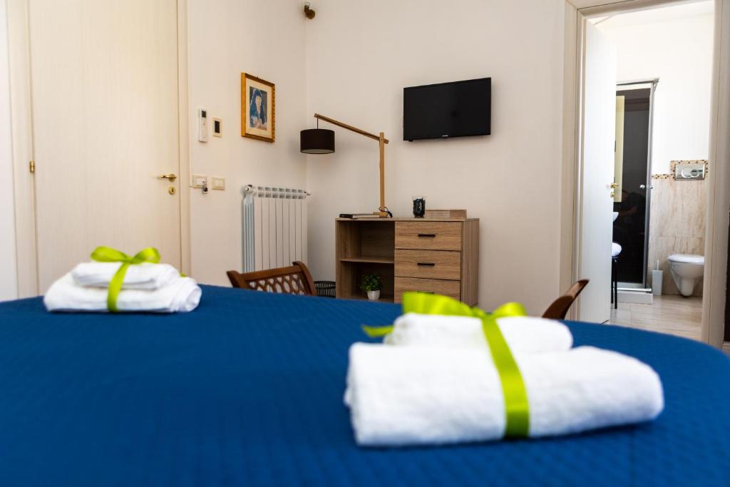 Letto o letti in una camera di Ai Mercati di Palermo
