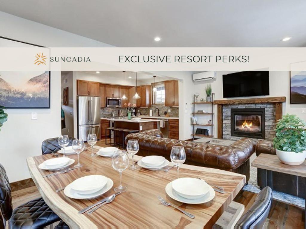 a dining room with a table with wine glasses at Great Location Near Pool with Suncadia Pool Access in Cle Elum