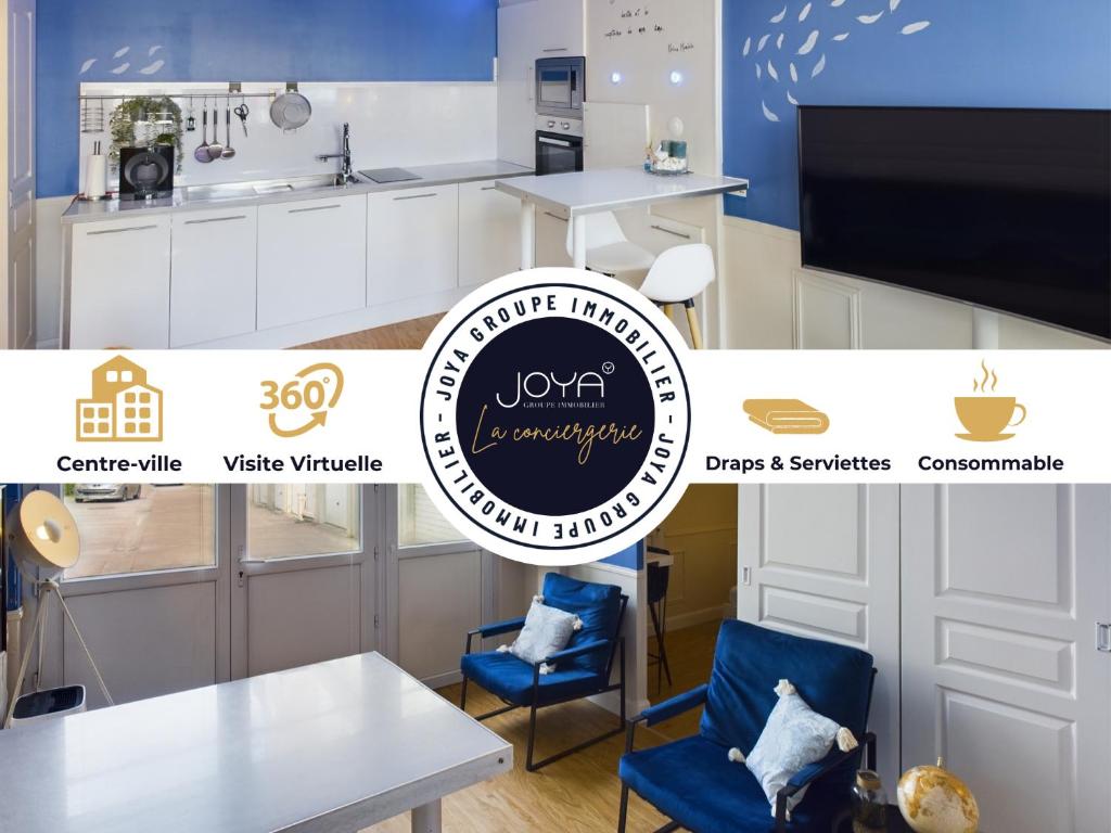 une cuisine avec des placards blancs et une table et des chaises blanches dans l'établissement Repaire de l'Explorateur, à Troyes