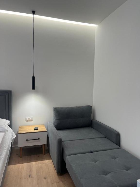 Postel nebo postele na pokoji v ubytování Vlora Sunset Rooms
