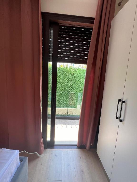 Postel nebo postele na pokoji v ubytování Vlora Sunset Rooms