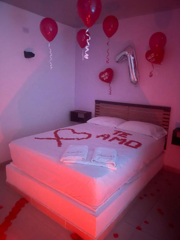 Postel nebo postele na pokoji v ubytování Hotel ZT