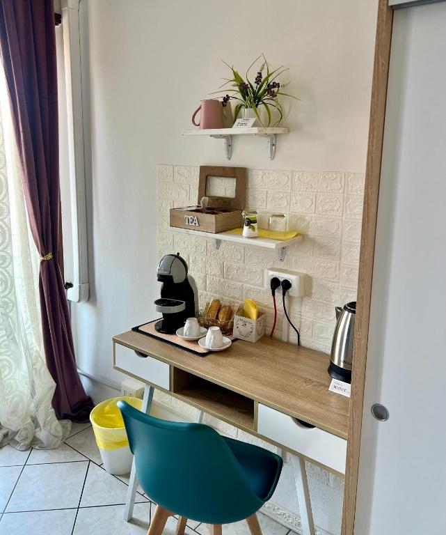 Kuchyň nebo kuchyňský kout v ubytování Verona Rooms