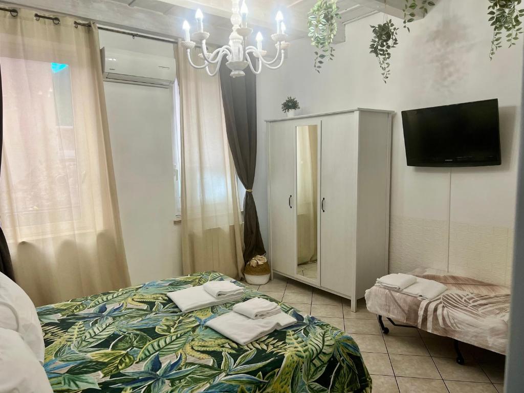 Postel nebo postele na pokoji v ubytování Verona Rooms