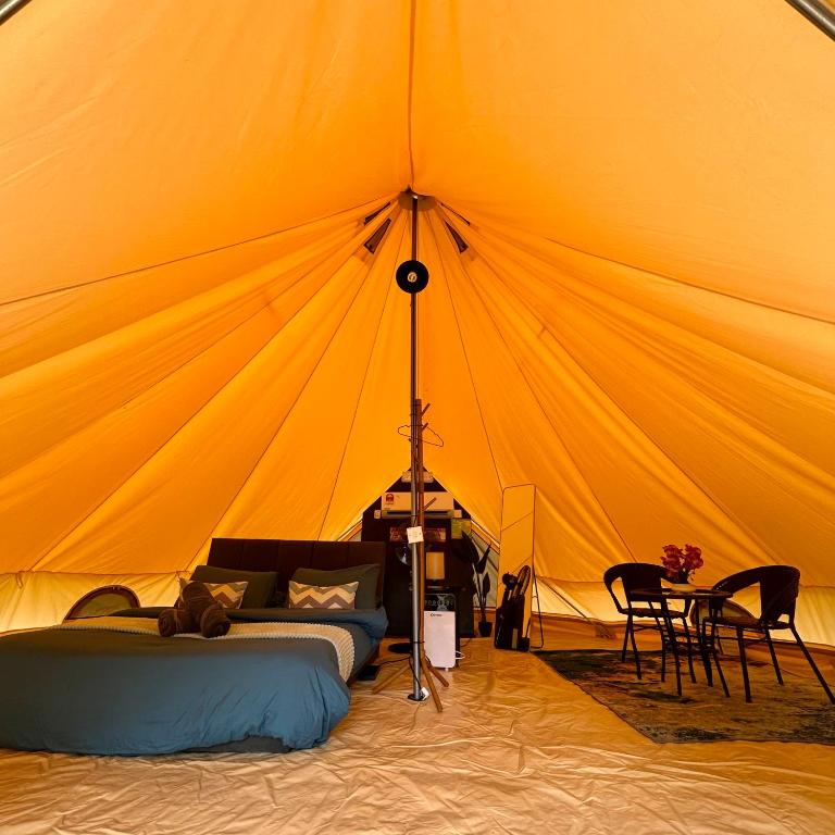 Letto o letti in una camera di Glamping Wetland Putrajaya