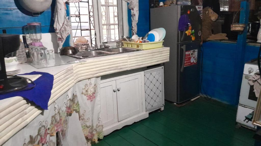Una cocina o cocineta en Hostal Cafe Axel