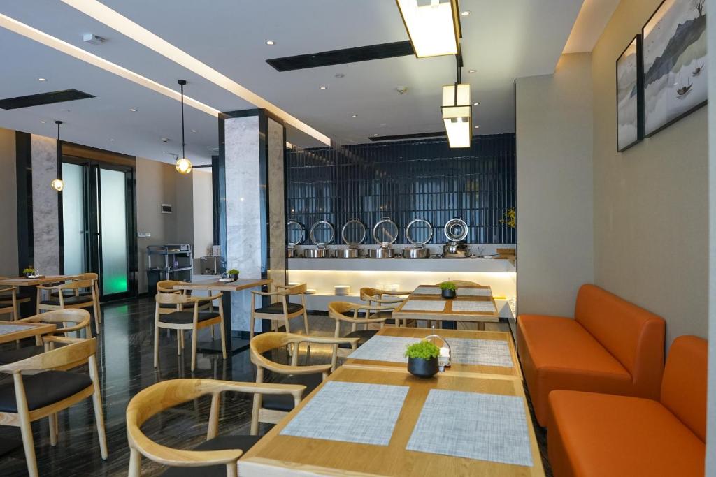 Posezení v ubytování Paco Hotel Guangzhou Baiyun Airport Liantang Metro