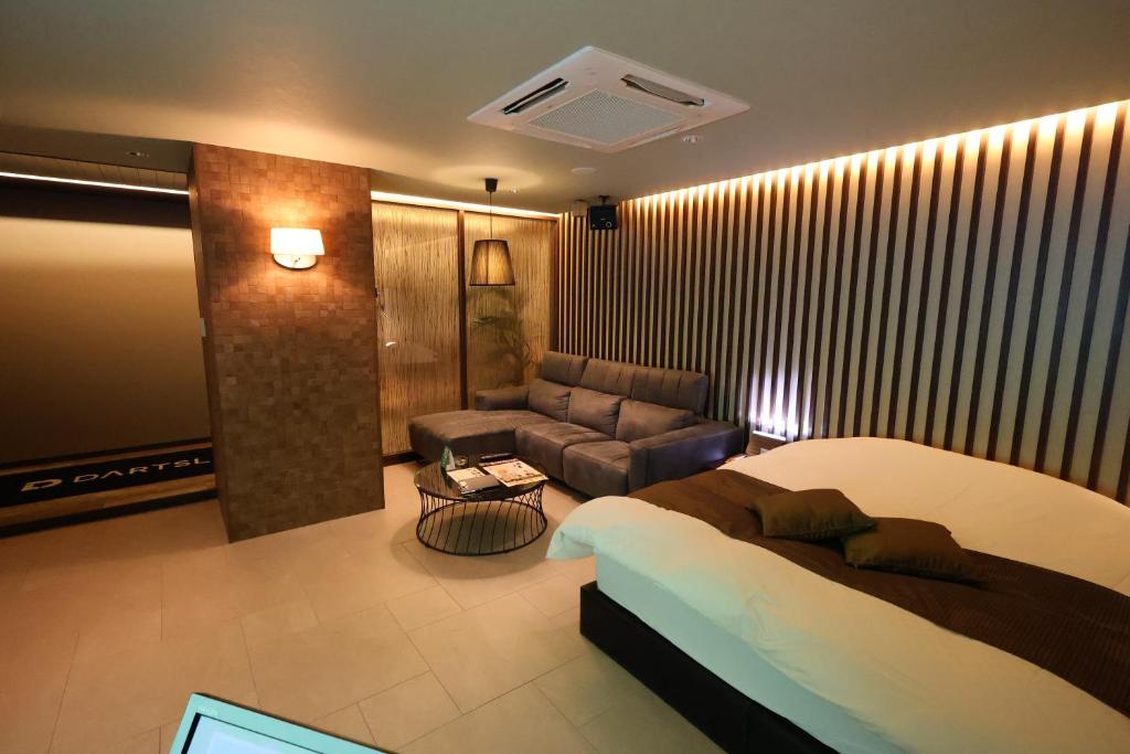 HOTEL felice Osaka -伊丹空港-にあるベッド