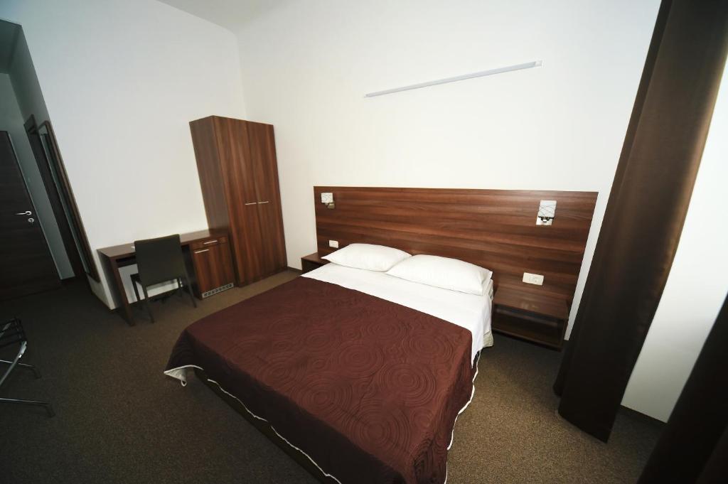 Postel nebo postele na pokoji v ubytování Riva Rooms