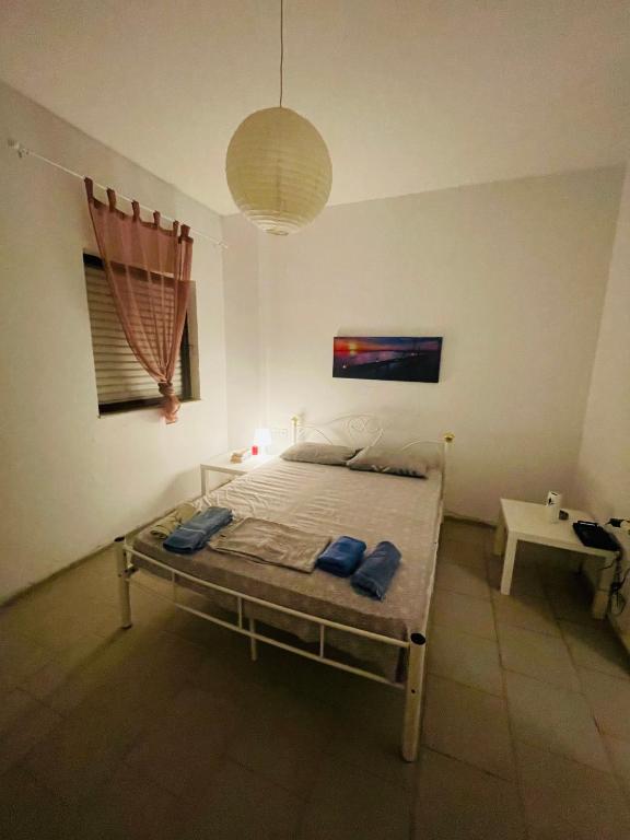Postel nebo postele na pokoji v ubytování akrata siesta