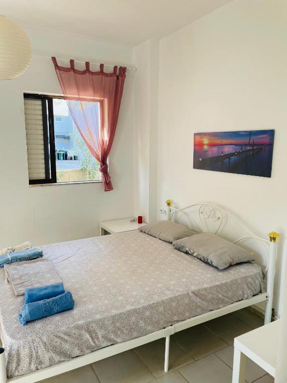 Postel nebo postele na pokoji v ubytování akrata siesta