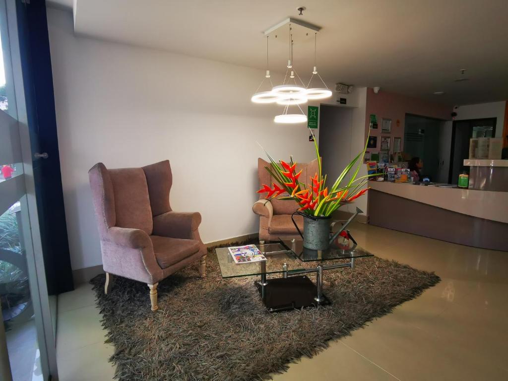 Posezení v ubytování Hotel Lleras Express