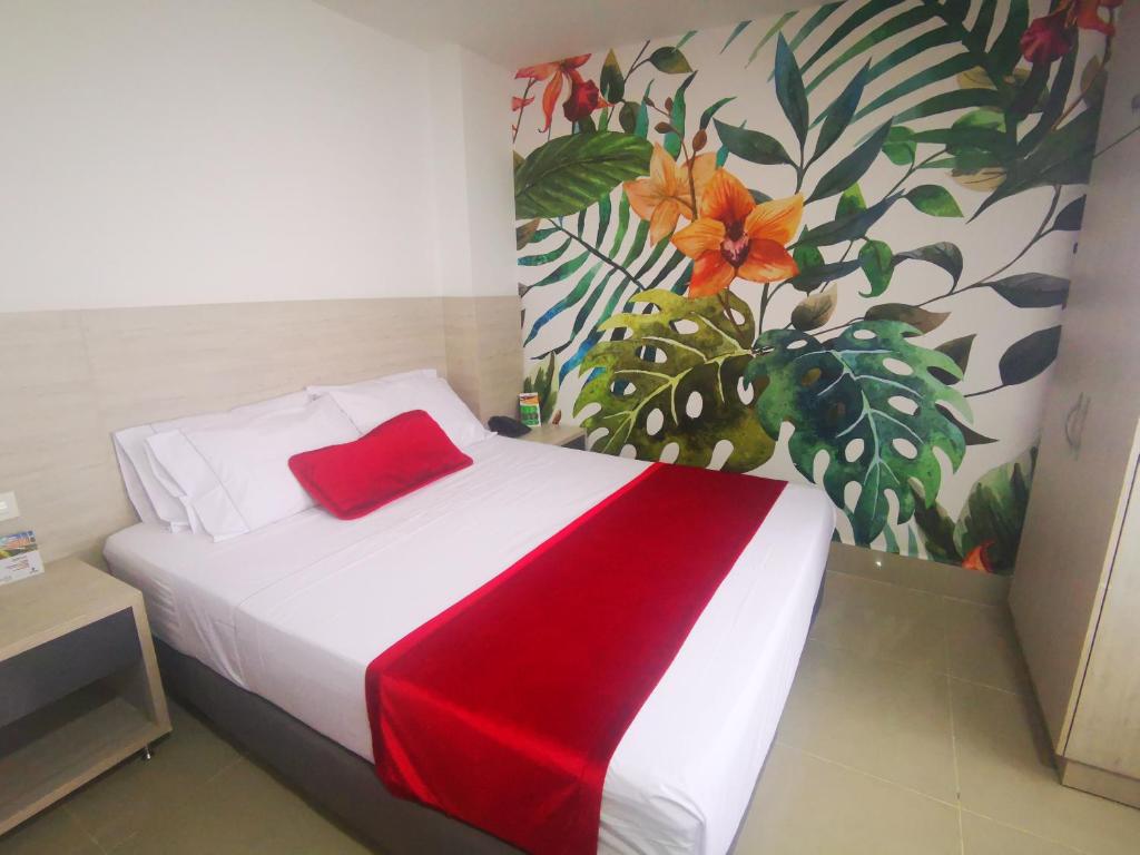 Postel nebo postele na pokoji v ubytování Hotel Lleras Express