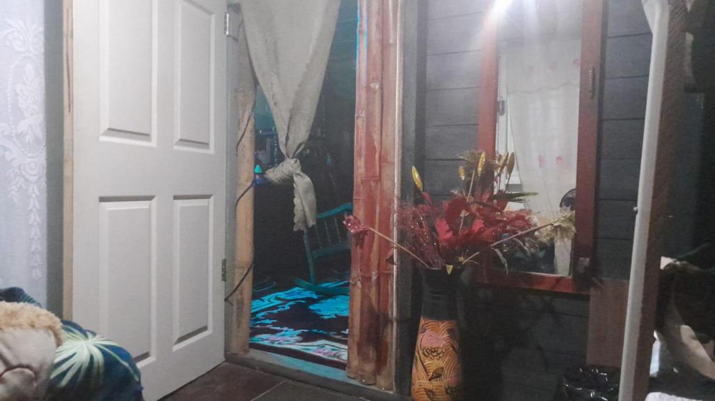 Una cama o camas en una habitación de Hostal Cafe Axel