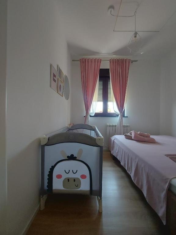Voodi või voodid majutusasutuse Bitini Farm Apartment toas