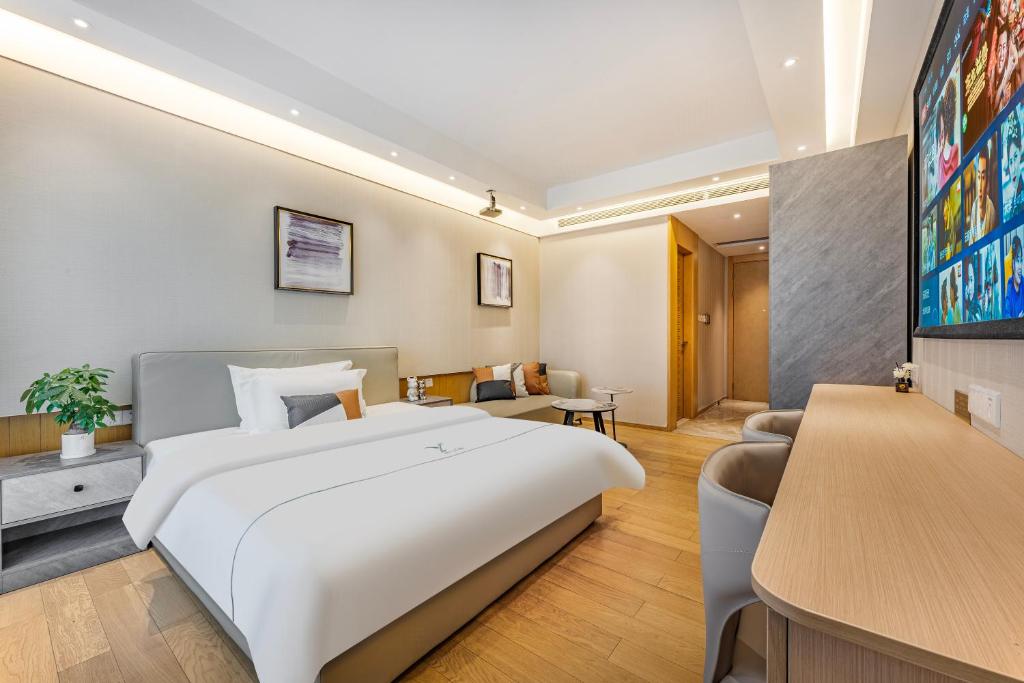 Postel nebo postele na pokoji v ubytování Raffles Executive Apartment - Guangzhou Huijin International Finance Center, Keyun Road Metro Station Branch-Canton Fair Free Shuttle