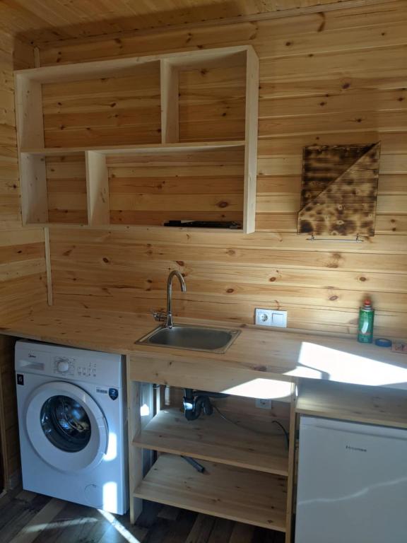 Kuchyň nebo kuchyňský kout v ubytování Krikhi Village