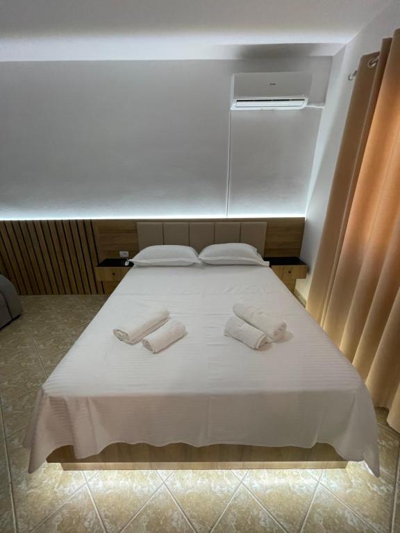 Postel nebo postele na pokoji v ubytování Hotel Riti