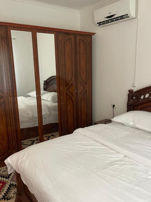 Postel nebo postele na pokoji v ubytování Hotel Riti