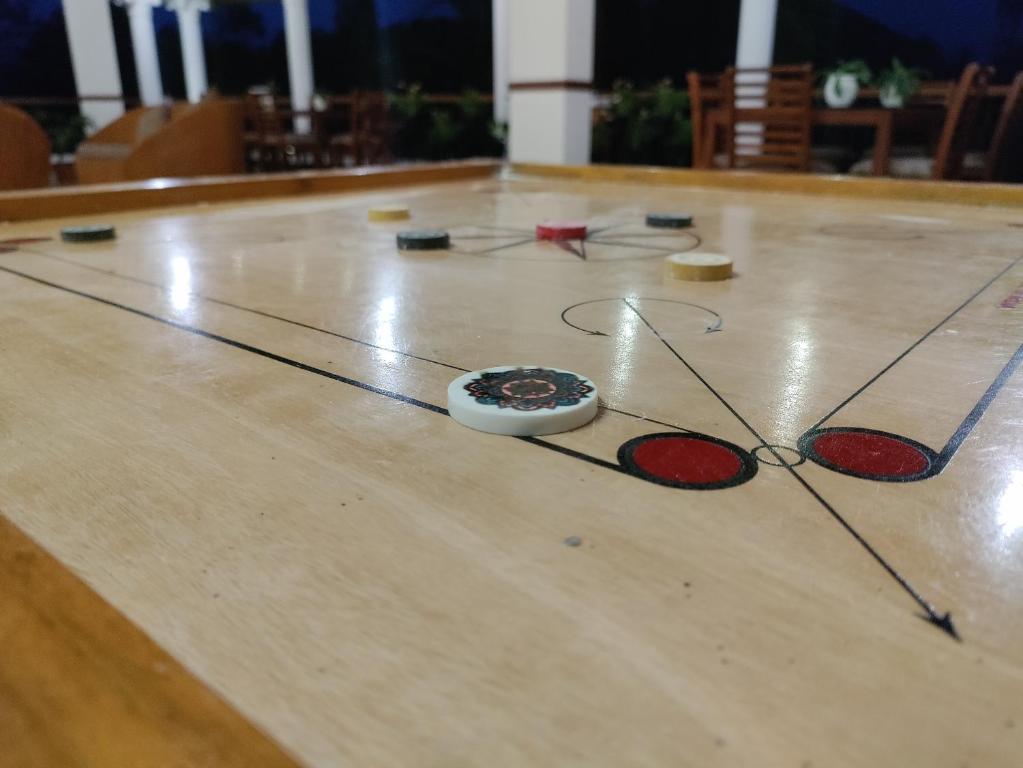 a bowling alley with pins on the floor at The Cana's Coorg in Ammatti