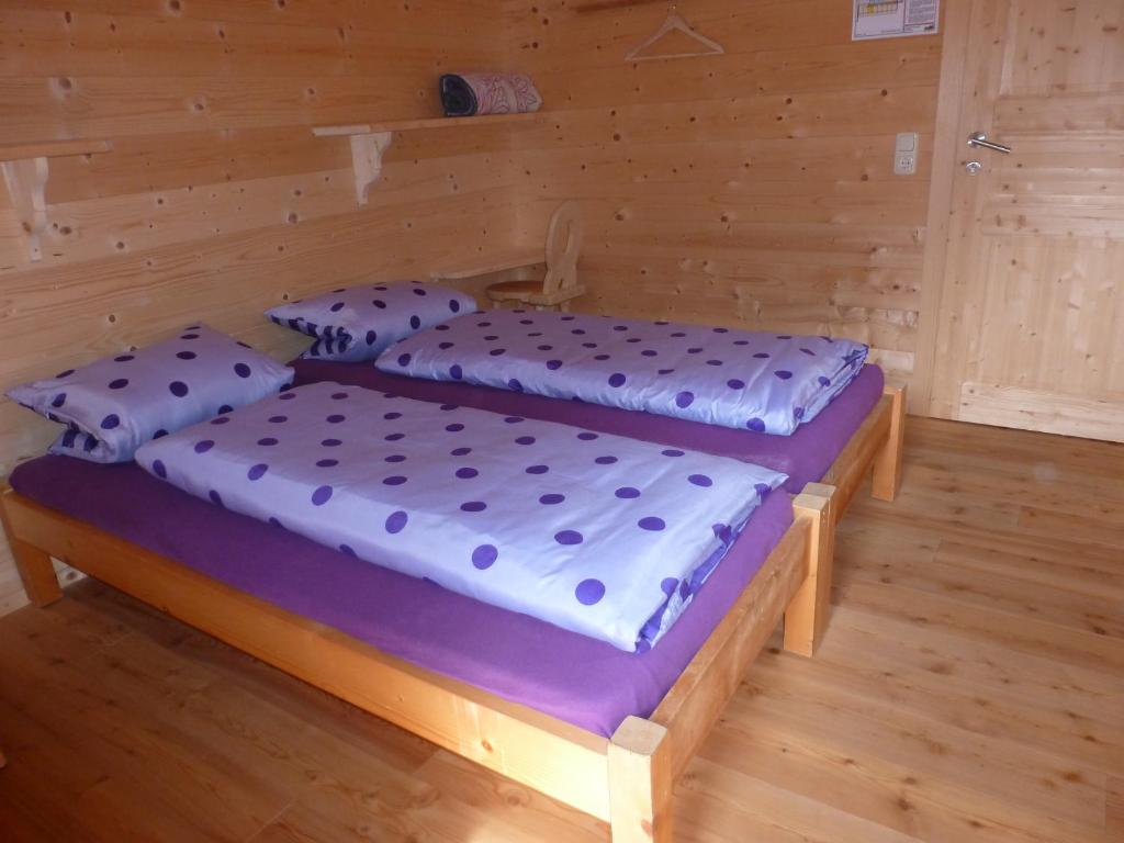 Postel nebo postele na pokoji v ubytování Binsalm- Schutzhütte