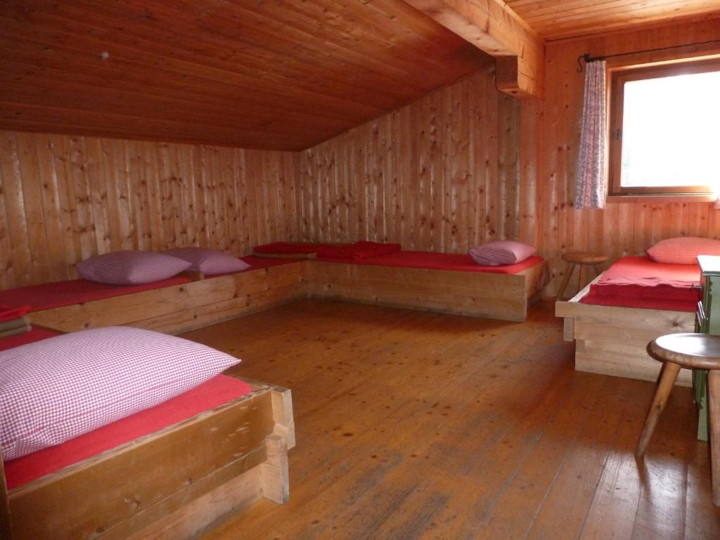 Postel nebo postele na pokoji v ubytování Binsalm- Schutzhütte