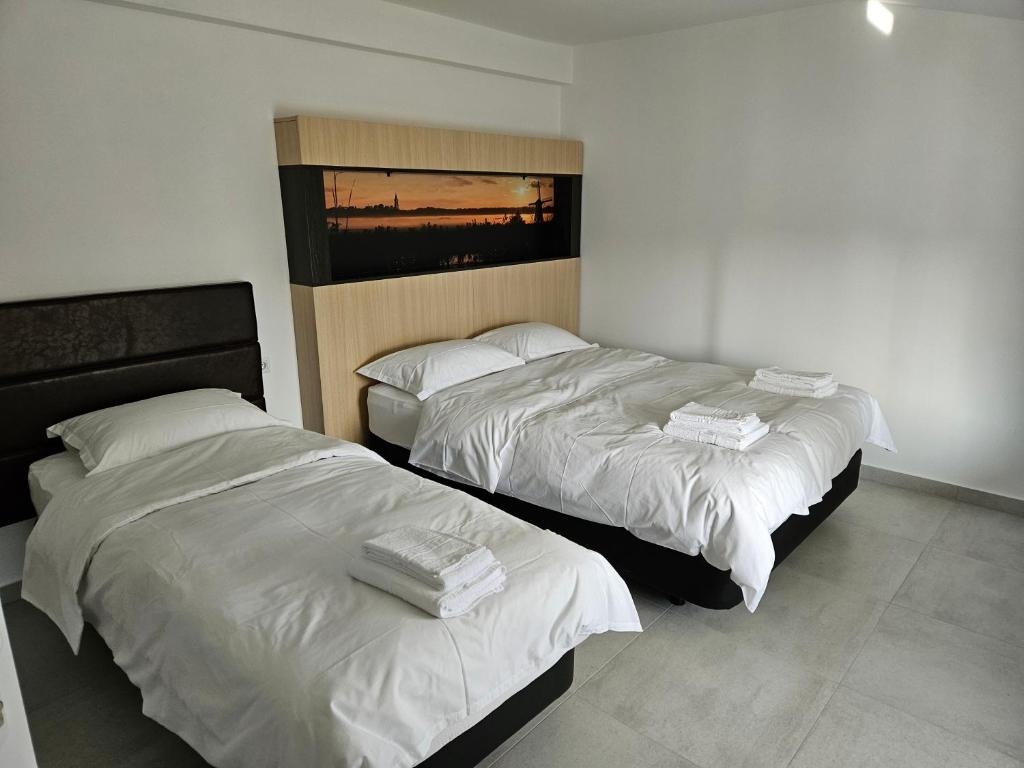 Postel nebo postele na pokoji v ubytování CASA Cristian
