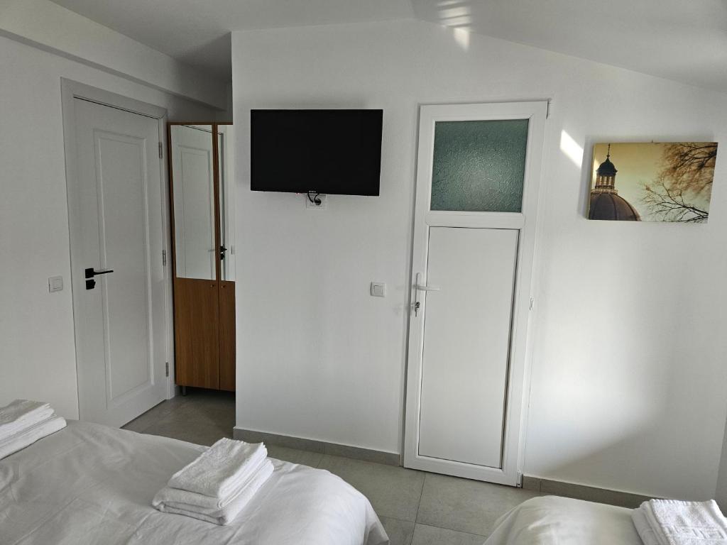 Postel nebo postele na pokoji v ubytování CASA Cristian