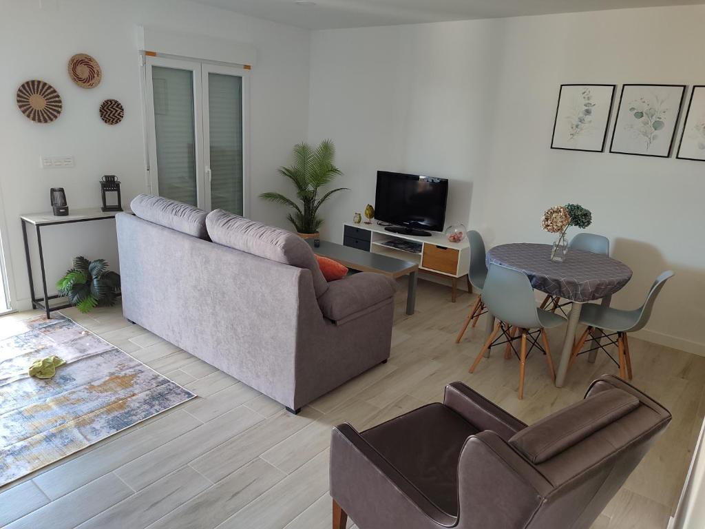 Televízia a/alebo spoločenská miestnosť v ubytovaní Casita con encanto entre viñedos
