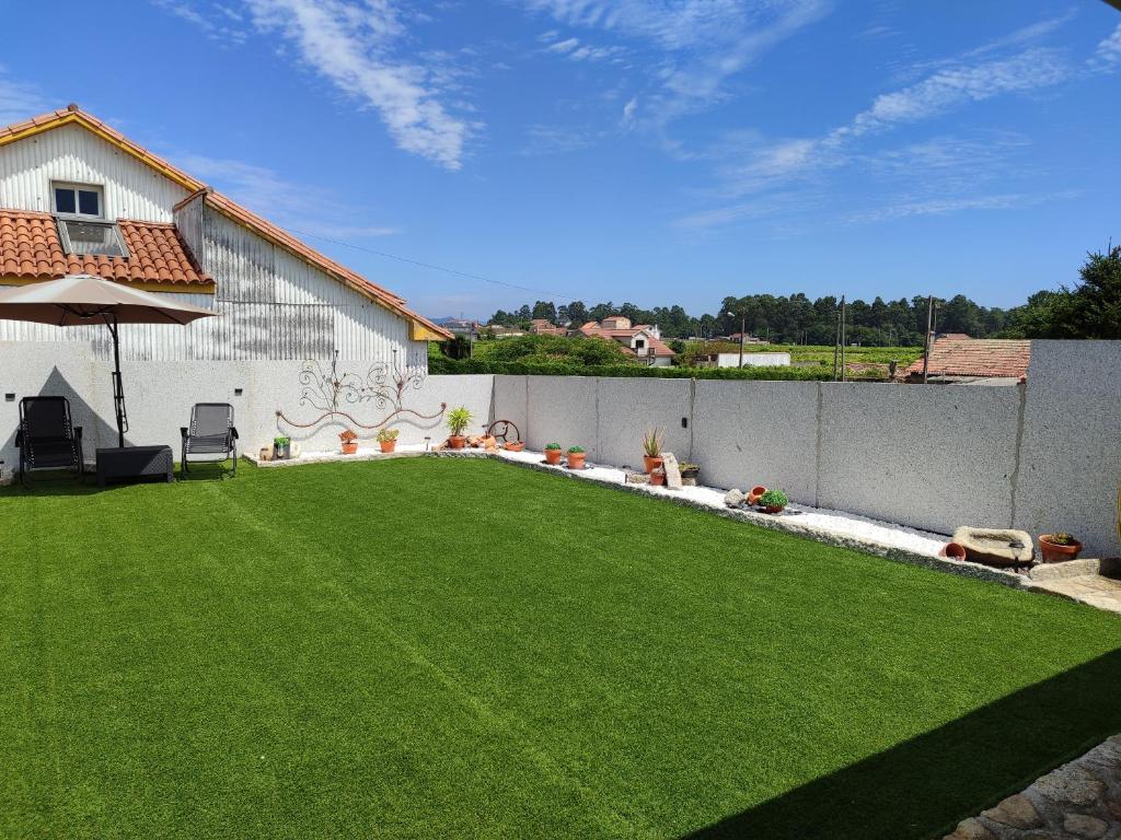 Vonkajšia záhrada v ubytovaní Casita con encanto entre viñedos