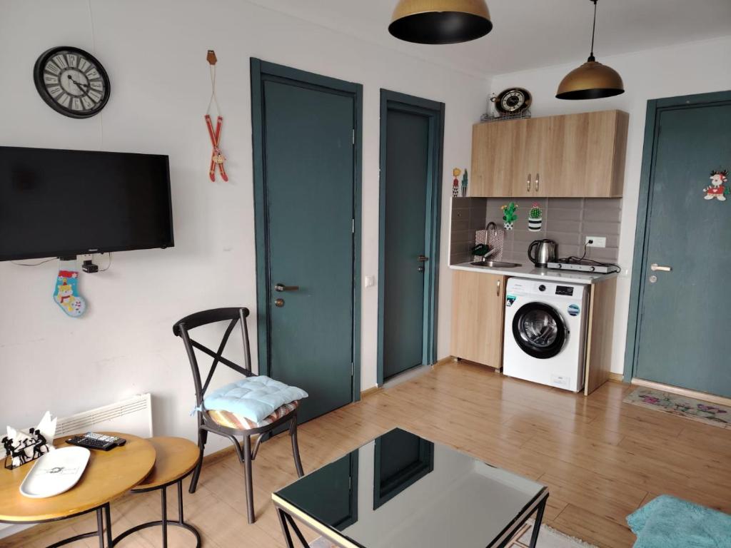 Kuchyň nebo kuchyňský kout v ubytování Apart Hotel ART