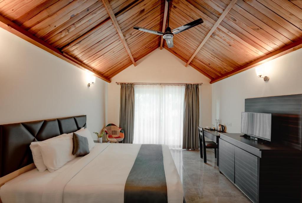 Postel nebo postele na pokoji v ubytování White Wood Resort By Stone Wood Hotels