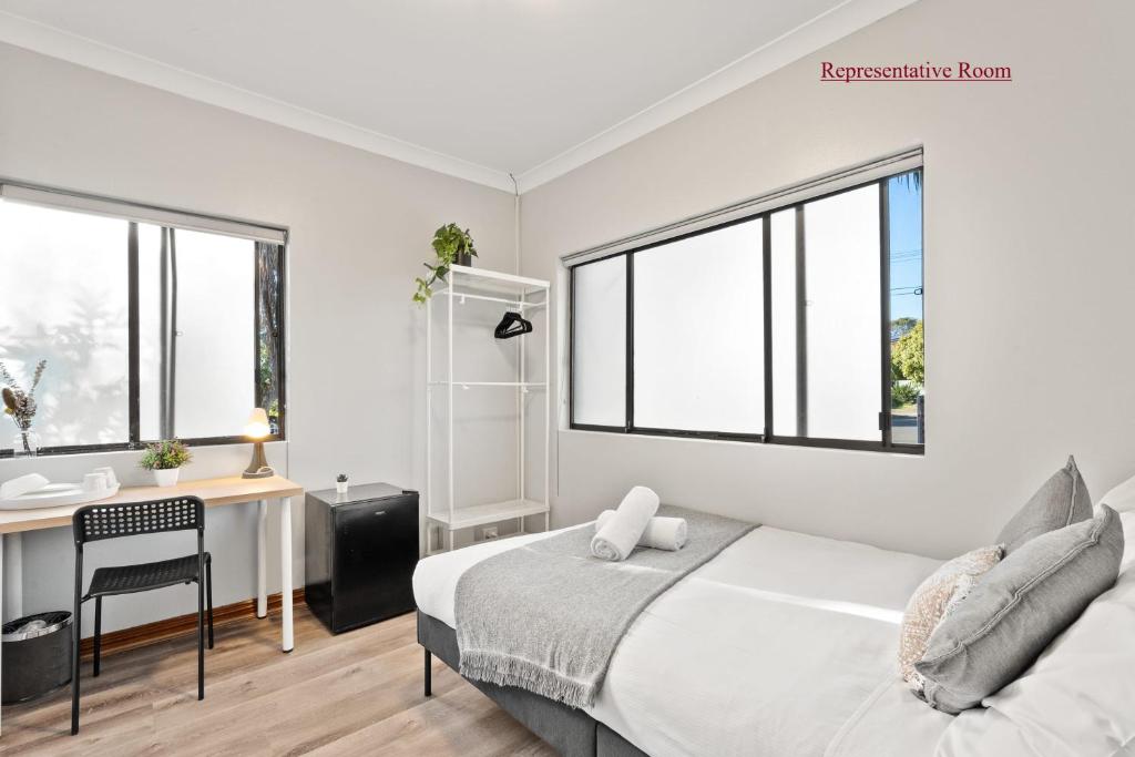 Ένα ή περισσότερα κρεβάτια σε δωμάτιο στο Cozy Double Room - Mins to Station & Olympic Park - Shared Bathroom