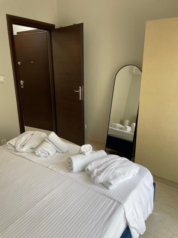 Postel nebo postele na pokoji v ubytování Kaza Oasis