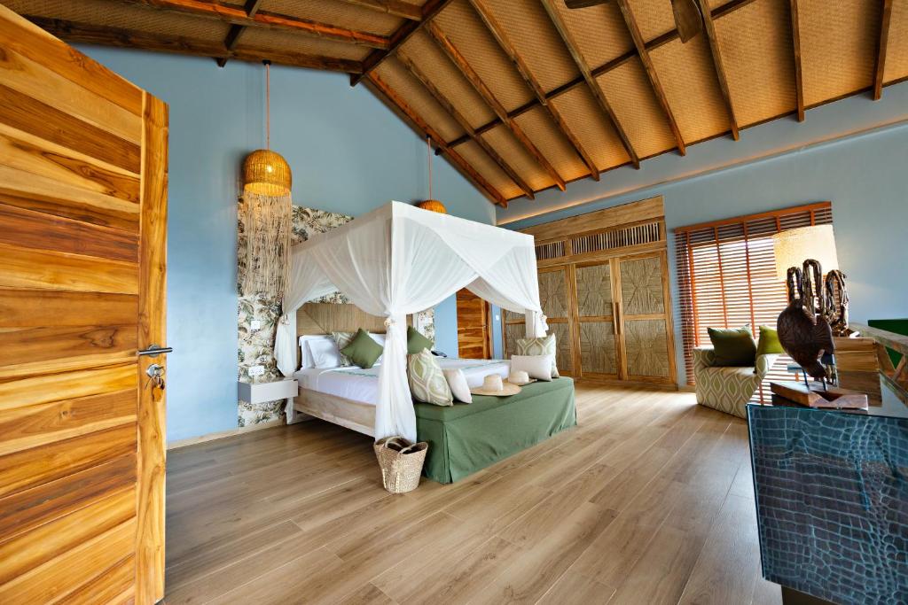 Postel nebo postele na pokoji v ubytování Bawe Island Zanzibar