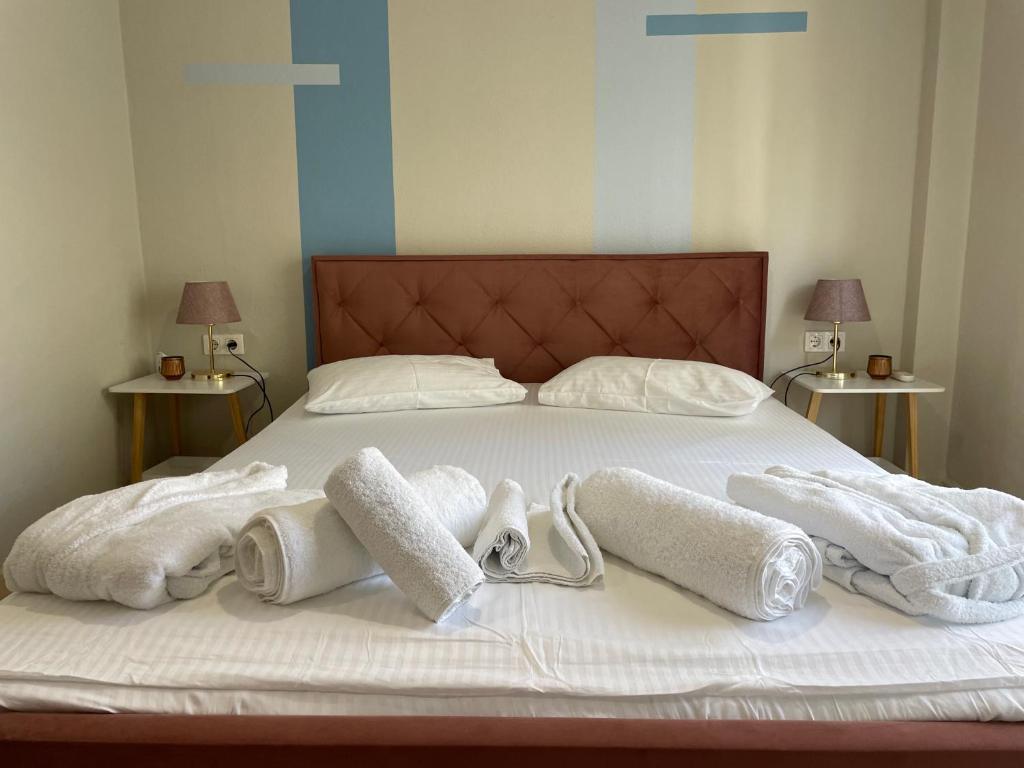 Postel nebo postele na pokoji v ubytování Kaza Oasis