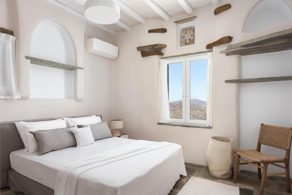 Postel nebo postele na pokoji v ubytování Morfes Luxury Apartments
