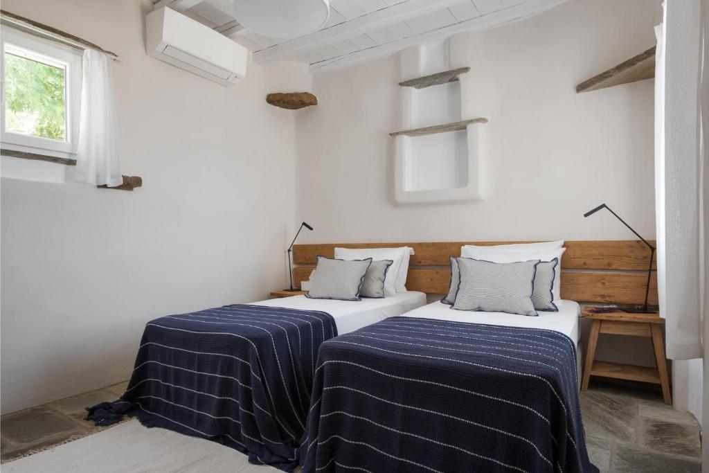Postel nebo postele na pokoji v ubytování Morfes Luxury Apartments