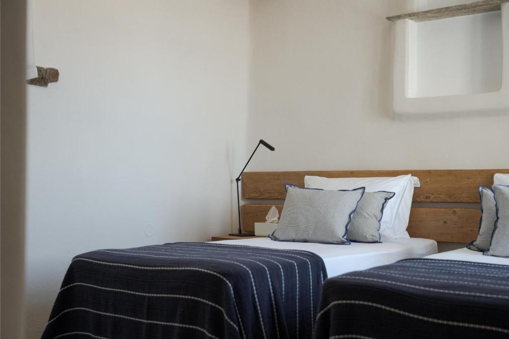 Postel nebo postele na pokoji v ubytování Morfes Luxury Apartments