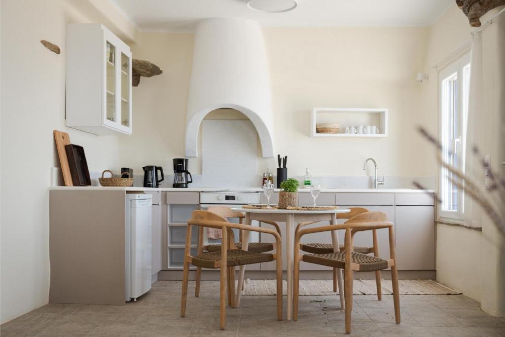 Kuchyň nebo kuchyňský kout v ubytování Morfes Luxury Apartments