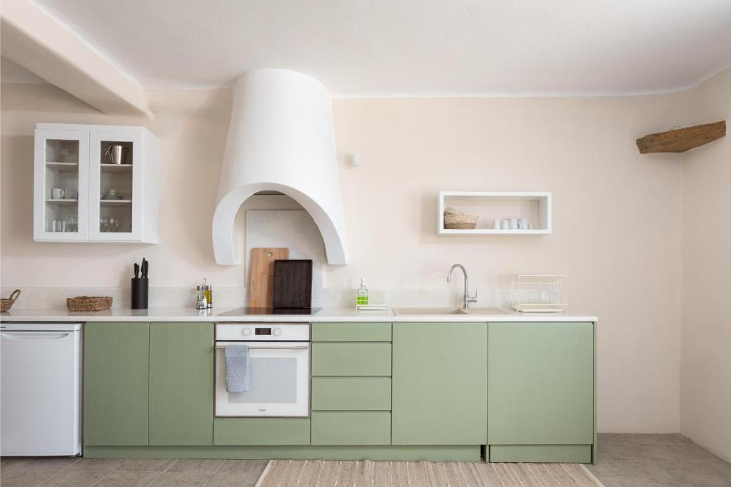 Kuchyň nebo kuchyňský kout v ubytování Morfes Luxury Apartments