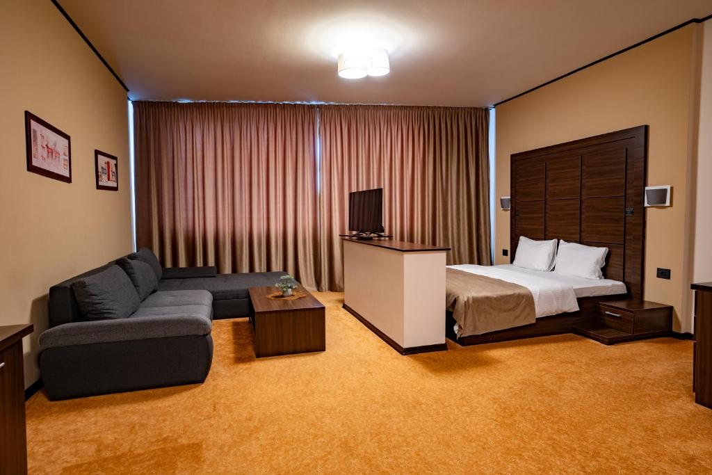 Postel nebo postele na pokoji v ubytování Hotel Aurelia